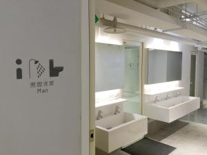 Baðherbergi á 日初青旅 Sundaily Hostel 北車