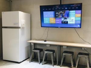 Eldhús eða eldhúskrókur á 日初青旅 Sundaily Hostel 北車