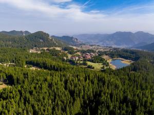 an aerial view of a village in the mountains at Oak Residence Hotel & Relax in Smolyan