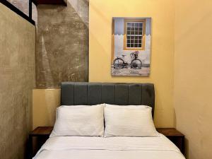 Cama ou camas em um quarto em 210 Aparta Studio Boutique en mansión siglo XIX