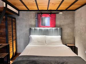 Cama ou camas em um quarto em 211 Aparta Studio Boutique en mansión siglo XIX