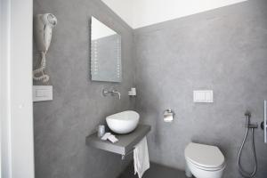 Ванна кімната в Maison Cevoli