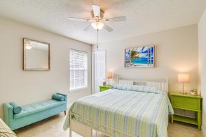 a bedroom with a bed and a ceiling fan at Family-Friendly Foley Getaway with Fenced Yard! in Foley