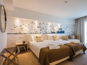 Ein Bett oder Betten in einem Zimmer der Unterkunft MH Peniche