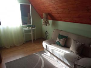 Postel nebo postele na pokoji v ubytování Ruža