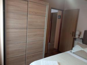 Postel nebo postele na pokoji v ubytování Ruža