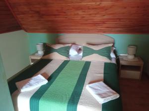 Postel nebo postele na pokoji v ubytování Ruža