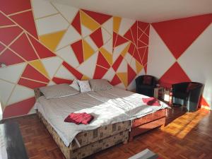 Postel nebo postele na pokoji v ubytování Szaffi apartman