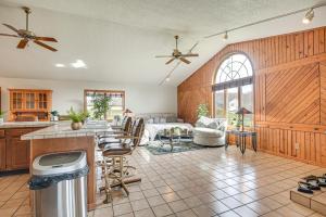 a kitchen and living room with a bed in the background at Pet-Friendly Ohio Escape with Pool, Deck and Fire Pit! in Mount Vernon