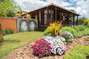 Um jardim em Pousada Rancho Soberbo, Serra do Cipó