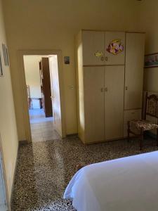 Ein Bett oder Betten in einem Zimmer der Unterkunft A Casa Di Cosimina