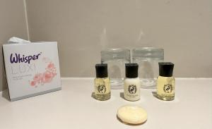 three bottles of champagne next to a gift box at The Kings Head Country Hotel in King's Lynn +18 photos