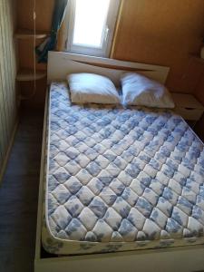 Postel nebo postele na pokoji v ubytování Chalet bois