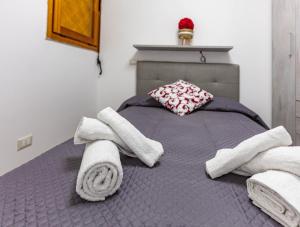 Ένα ή περισσότερα κρεβάτια σε δωμάτιο στο Portisco Living