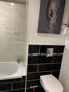 Kúpeľňa v ubytovaní Super appartement cosy, parking privé