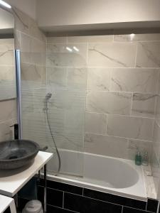 Kúpeľňa v ubytovaní Super appartement cosy, parking privé