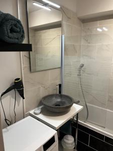 Kúpeľňa v ubytovaní Super appartement cosy, parking privé