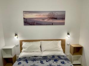 Ένα ή περισσότερα κρεβάτια σε δωμάτιο στο Villa Antonietta 4, Relax nella pineta