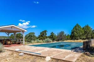 an image of a swimming pool with a pavilion at Mountain Vista - Main House in Hesperus