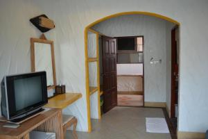 TV a/nebo společenská místnost v ubytování Nirvana Guesthouse & Hostel