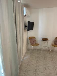 A television and/or entertainment centre at Casa San Domingo