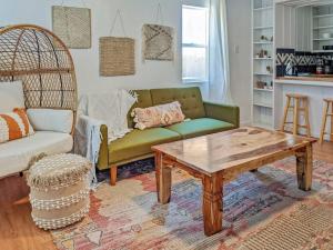 a living room with a couch and a coffee table at Explorer's Haven, Venture Base Unit 5 in Kanab