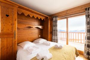 Posteľ alebo postele v izbe v ubytovaní Résidence Les Alpages de Chantel - maeva Home - Appartement 3 Pièces 6 Personnes - Sélection MAE-1652 + 20 fotografií