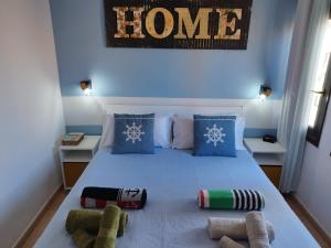 A bed or beds in a room at Casa del Mar Air-conditioned Apartment with Swimming Pools - Corralejo Playa