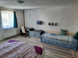 Postel nebo postele na pokoji v ubytování Pension Lípa + 37 fotografií