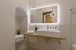 Ένα μπάνιο στο Martini Rooms Castello