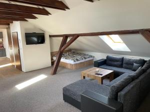 Posezení v ubytování Apartmán pod Kňeží Horou