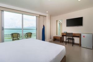 TV a/nebo společenská místnost v ubytování Hotel Summer Frente Al Mar