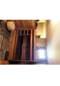 a room with a wooden door in a room at R&eacute;sidence Le Galibier 3 66910 in Les Deux Alpes