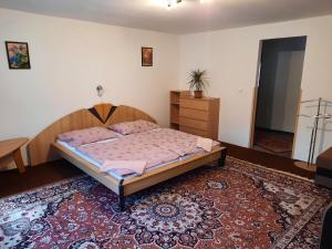 Postel nebo postele na pokoji v ubytování Pension Lípa