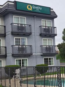 a building with balconies on the side of it at Quality Inn Tracy I-205 in Tracy