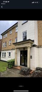 a building with a front door of a house at Stunning Studio Flat - Free Parking - 3 min from Sutton Station in Sutton
