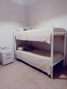 Postel nebo postele na pokoji v ubytování Lo de Norma