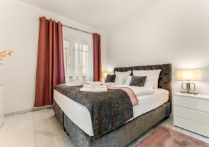 Postel nebo postele na pokoji v ubytování LoC-Luxus Apartment nahe Oldenburg