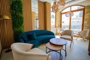 A seating area at Asterina Hotel