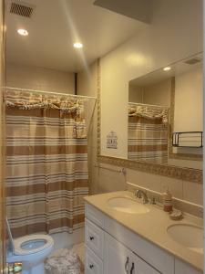 A bathroom at 2 Bedroom Bliss in College Point