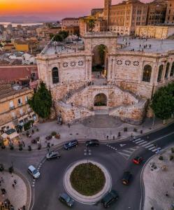 an aerial view of a city with cars parked at Luxury Loft 35 in Cagliari