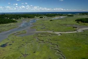 an aerial view of a river with grass and trees at PREMIUM PROPERTY - Private 2-Acre Retreat - MODERN 4 Bedrooms - See Video Tour in Gloucester