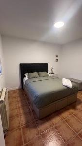Кровать или кровати в номере Albergue de Sonia