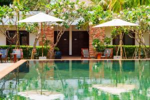 Bazén v ubytování Le Mayansa Resort nebo v jeho okolí