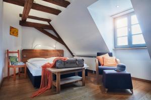 Postel nebo postele na pokoji v ubytování Breuer's Rüdesheimer Schloss