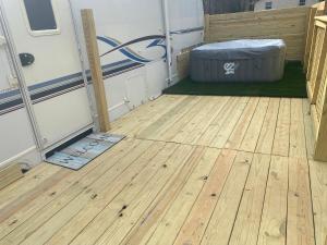 a room with a mattress sitting on a wooden floor at Romantic getaway in Decatur