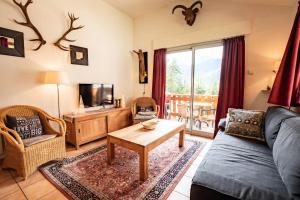 TV a/nebo společenská místnost v ubytování Les Chalets Petit Bonheur - LES CHALETS PETIT BONHEUR - CHT79 MAE-2494