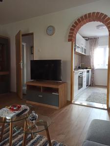 Kuchyň nebo kuchyňský kout v ubytování Apartment Jazz