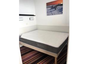a bed in a room with a mattress at Résidence Quartier Falaise - maeva Home - Appartement 2 pièces 7 personnes - Sélection MAE-9894 in Avoriaz