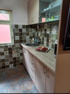Una cocina o cocineta en Iva apartment